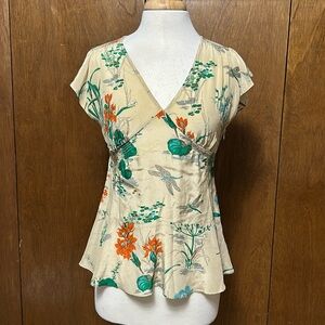 Anthropology 100% silk blouse in size small.